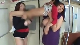 Two Voluptuous Asian Women Engage In Public Sex